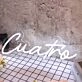 Cuatro White Neon Sign