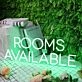 Rooms Available Green Neon Sign