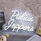 Pulius Jeppens White Neon Sign