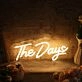 The Days Yellow Neon Sign