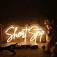 Short Stop Yellow Neon Sign