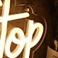 Short Stop Yellow Neon Sign