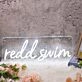 Redd Swim White Neon Sign