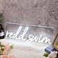 Redd Swim White Neon Sign