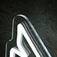 Letter M With Arrow Neon Sign