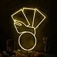 A Hand Holding Books Yellow Neon Sign
