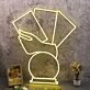 A Hand Holding Books Yellow Neon Sign