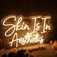 Skin Is In Aesthetics Yellow Neon Sign
