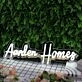 Aarden Homes White Neon Sign