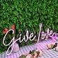 Give Love Purple Neon Sign