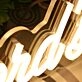 The Howard's Yellow Neon Sign