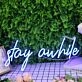 Stay A While Blue Neon Sign