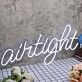 Airtight White Neon Sign