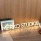 Merko Studios Yellow Neon Sign