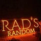 Rad's Random Orange Neon Sign