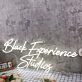 Black Experience Studios White Neon Sign