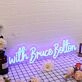 With Bruce Bolton Blue Neon Sign