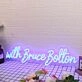 With Bruce Bolton Blue Neon Sign