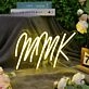 MMK Yellow Neon Sign