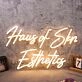 Haus Of Skn Esthetics Yellow Neon Sign