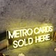 Metro Cards Sold Here Yellow Neon Sign