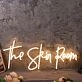 The Skin Room Yellow Neon Sign