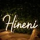 Hineni Yellow Neon Sign