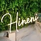 Hineni Yellow Neon Sign