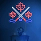 Maple leaves with crossed hockey sign in neon light