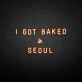 'I GOT BAKED IN SEOUL' neon sign
