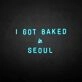 'I GOT BAKED IN SEOUL' neon sign