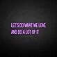 'Let's do what we love' neon sign