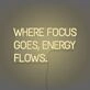 Where Focus Goes Energy Flows Neon Lettering Inspiring Concentration and Success