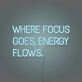 Where Focus Goes Energy Flows Neon Lettering Inspiring Concentration and Success