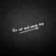Go up and never stop' neon sign