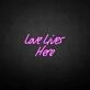 'Love Lives Here' neon sign