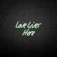 'Love Lives Here' neon sign