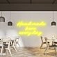 Hand Made Here Every Day Highlight Craftsmanship with Neon Art