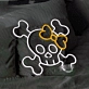 Neon sign with skull and crossbones