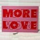 Love More Neon Sign: Infuse Your Space with Endless Affection