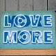 Love More Neon Sign: Infuse Your Space with Endless Affection