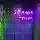 Strange Times: Illuminate Your Space with an Eccentric Vibe - Neon Sign