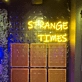 Strange Times: Illuminate Your Space with an Eccentric Vibe - Neon Sign