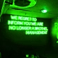 We Regret to Inform You We Are No Longer a Brothel Management Neon Sign: Changing Times in Neon