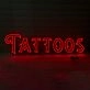 Tattoos Illuminate Your Space with Neon Art