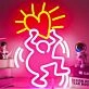 Single Abstract Figure Holding Heart Neon Light