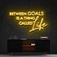 Between Goals Is A Thing Called Life Neon Sign for Inspirational Spaces
