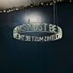 This Must Be The Place Circular Neon Sign for Modern Living Rooms