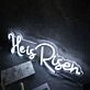 He Is Risen White Neon Sign for Religious and Spiritual Spaces