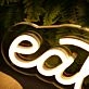 Eat Snacks Yellow Neon Sign for Food Lovers and Fun Spaces